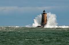 Crown Wave Surrounds Whaleback Lighthouse Stone Tower